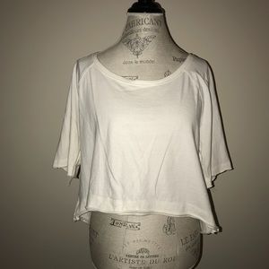 “WE THE FREE” WHITE CROPPED OPEN BACK TOP